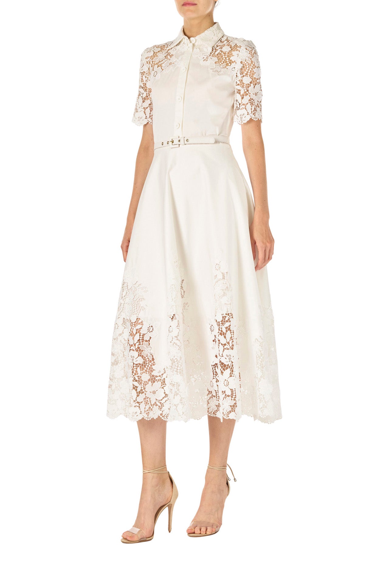 Monique Lhuillier Spring 2025 white cotton poplin dress with lace applique inserts, short sleeves, button down front bodice and belted waist - left side.