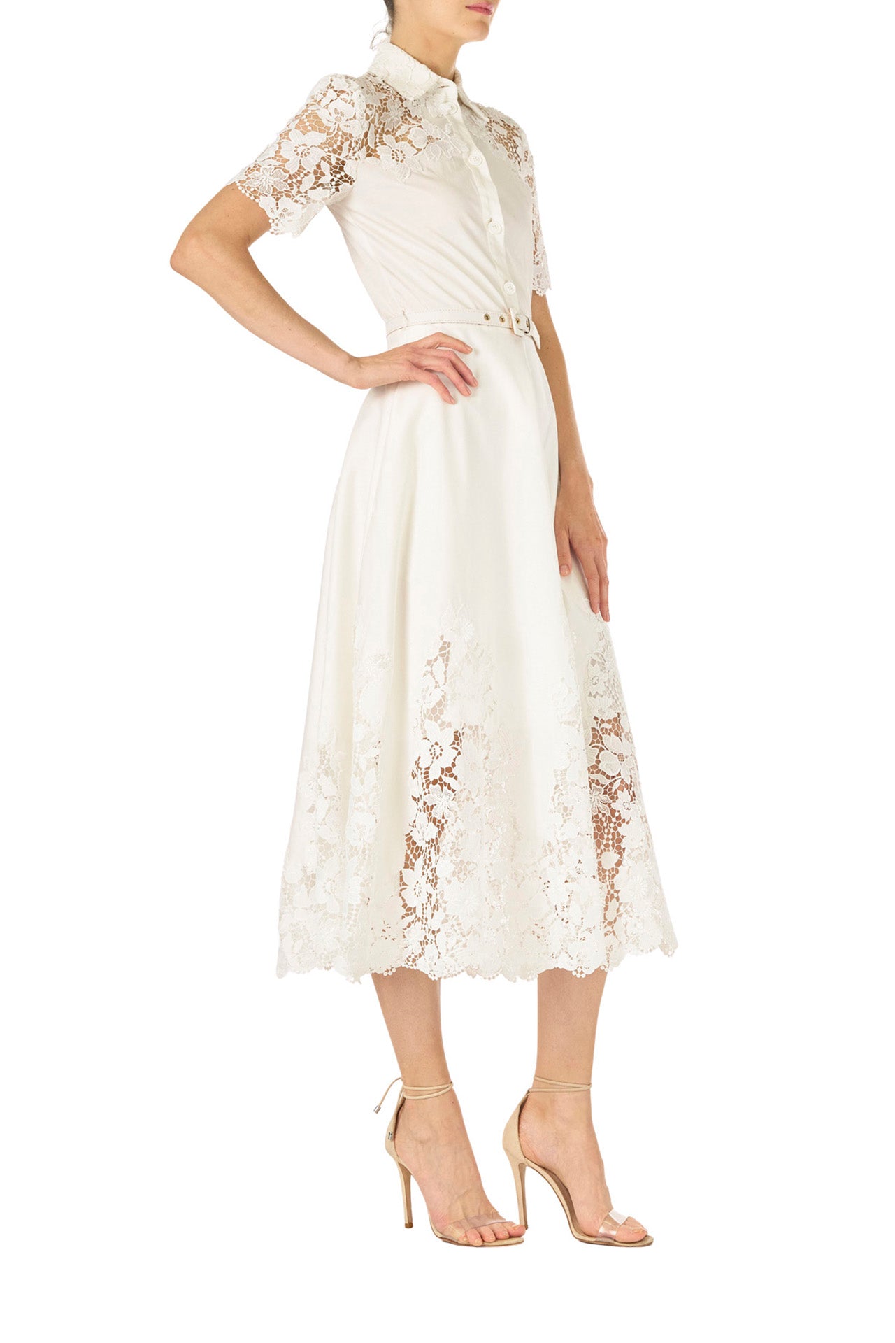 Monique Lhuillier Spring 2025 white cotton poplin dress with lace applique inserts, short sleeves, button down front bodice and belted waist - right side.