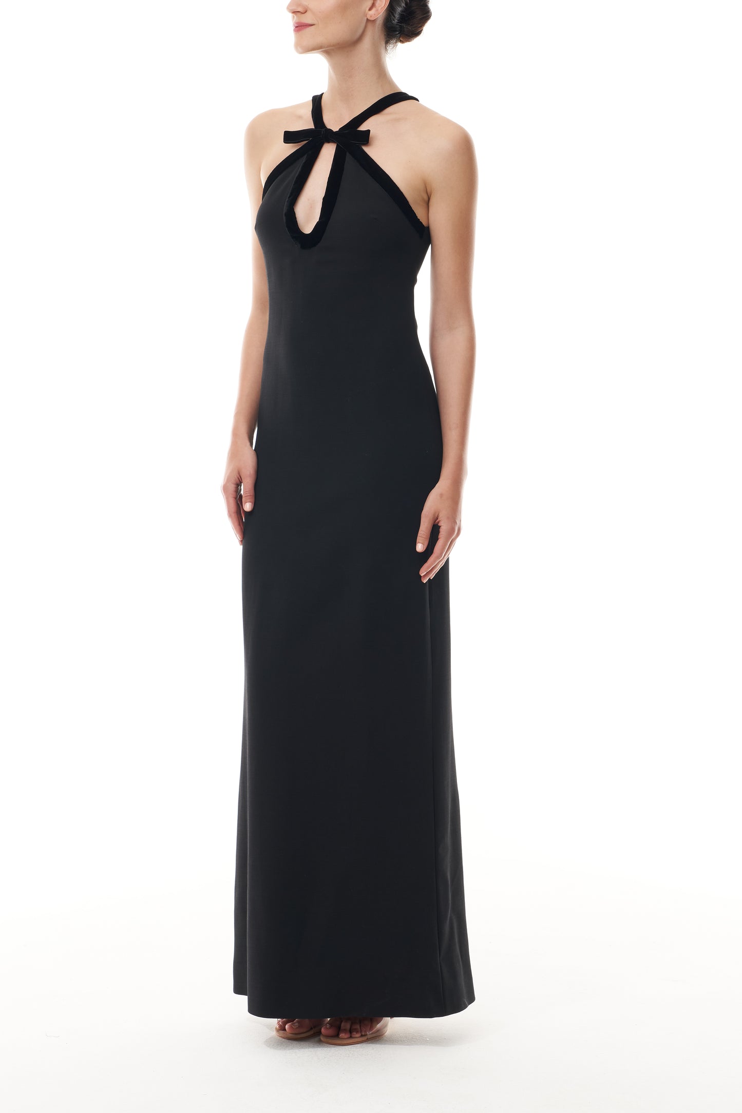 Monique Lhuillier Fall 2025 Noir Key-hole halter gown with velvet trim in Lightweight Silk Wool Suiting - side.