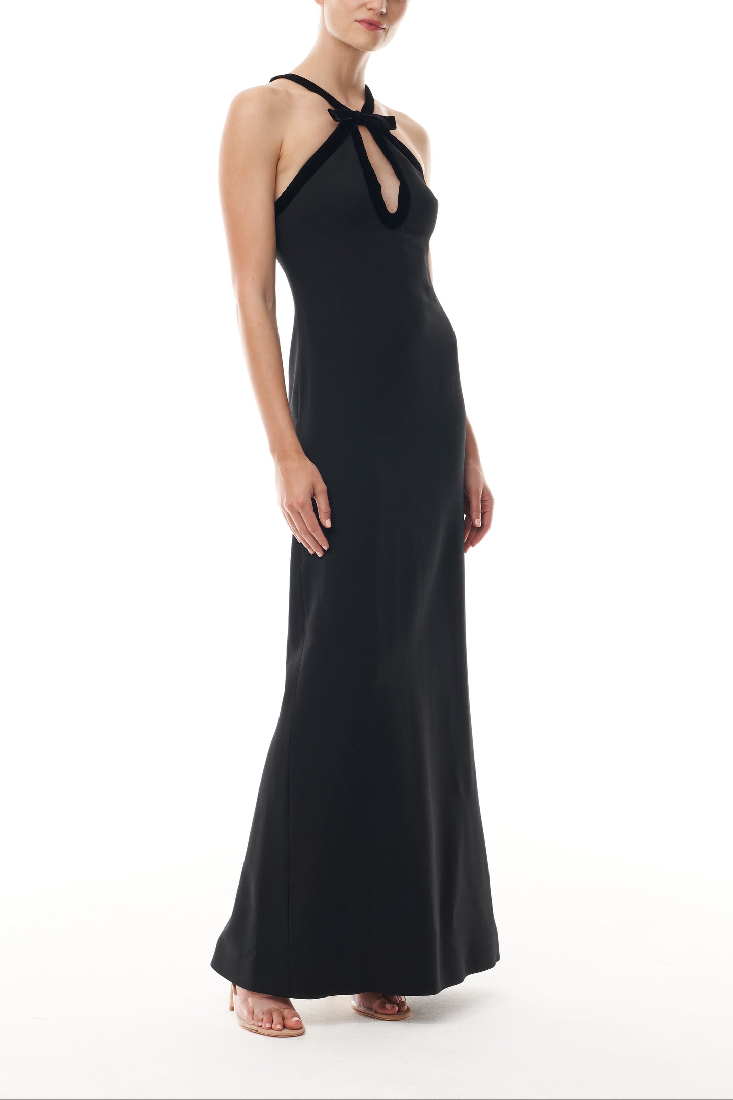 Monique Lhuillier Fall 2025 Noir Key-hole halter gown with velvet trim in Lightweight Silk Wool Suiting - side.