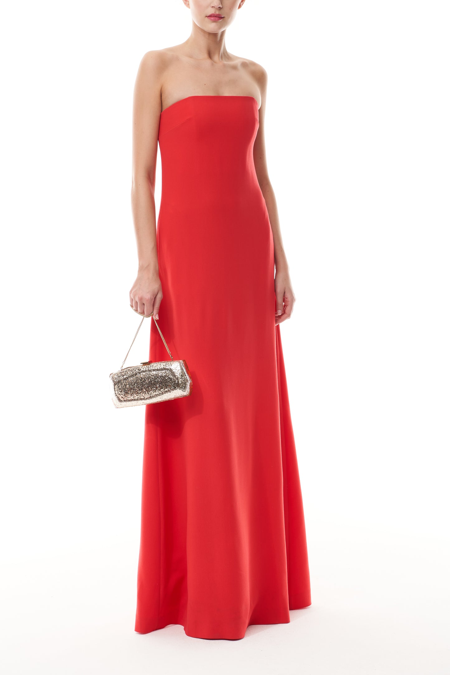 Monique Lhuillier Fall 2025 Vermilion Strapless A-line Gown Silk Wool Suiting - front with Champagne Viv Minaudiere.