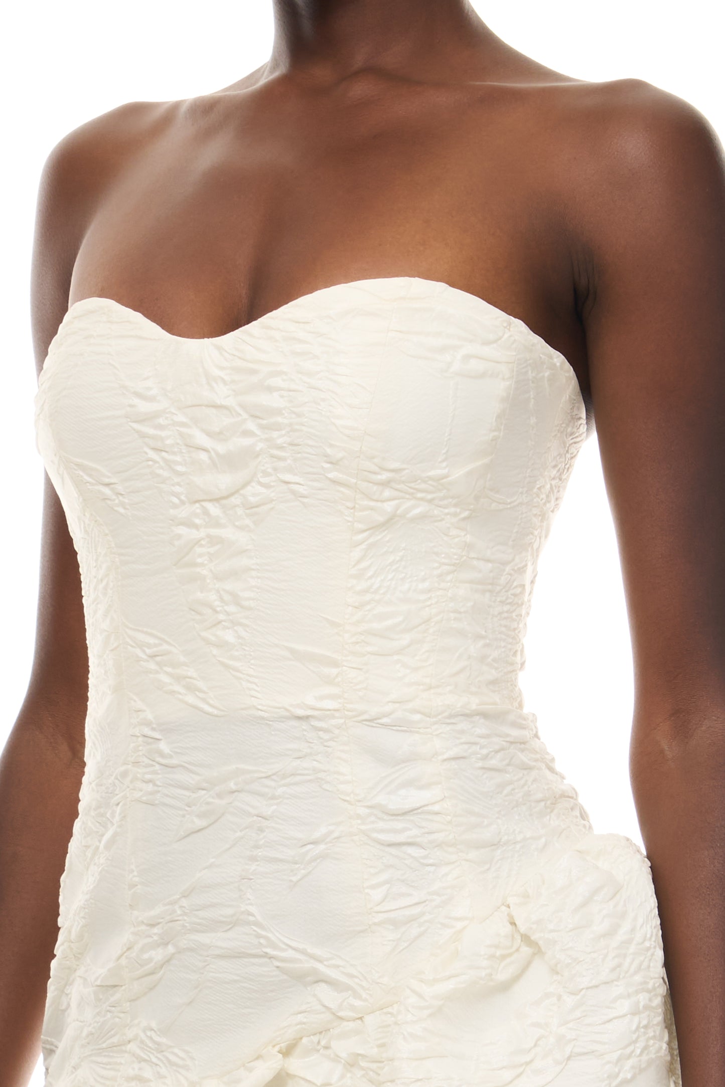 Monique Lhuillier Spring 2026 Ivory Botanical Matelassé Strapless dress with
asymmetric bubble skirt - fabric.