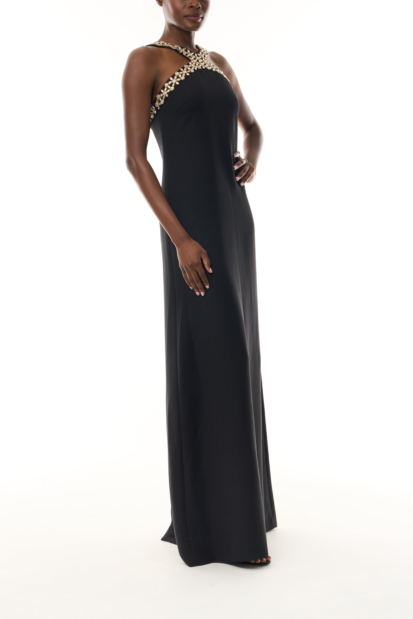 Monique Lhuillier Spring 2026 Noir Lightweight Silk Wool Suiting Cut - away neckline with gold crystal embroidery - side.