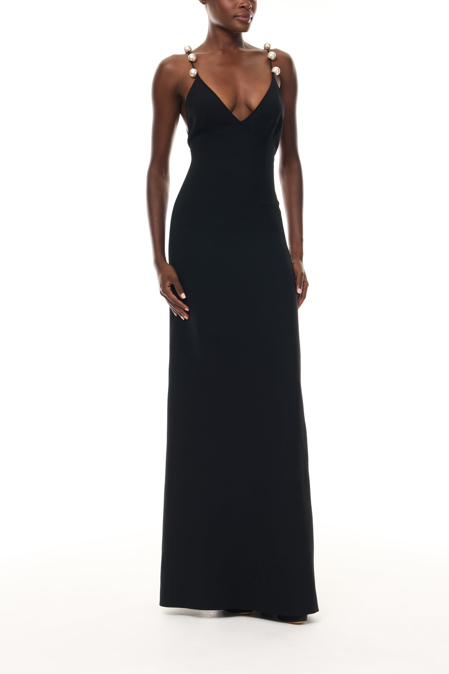 Monique Lhuillier Spring 2026 Noir Lightweight Silk Wool Suiting A - line V -neck gown with pearl ball straps -front.