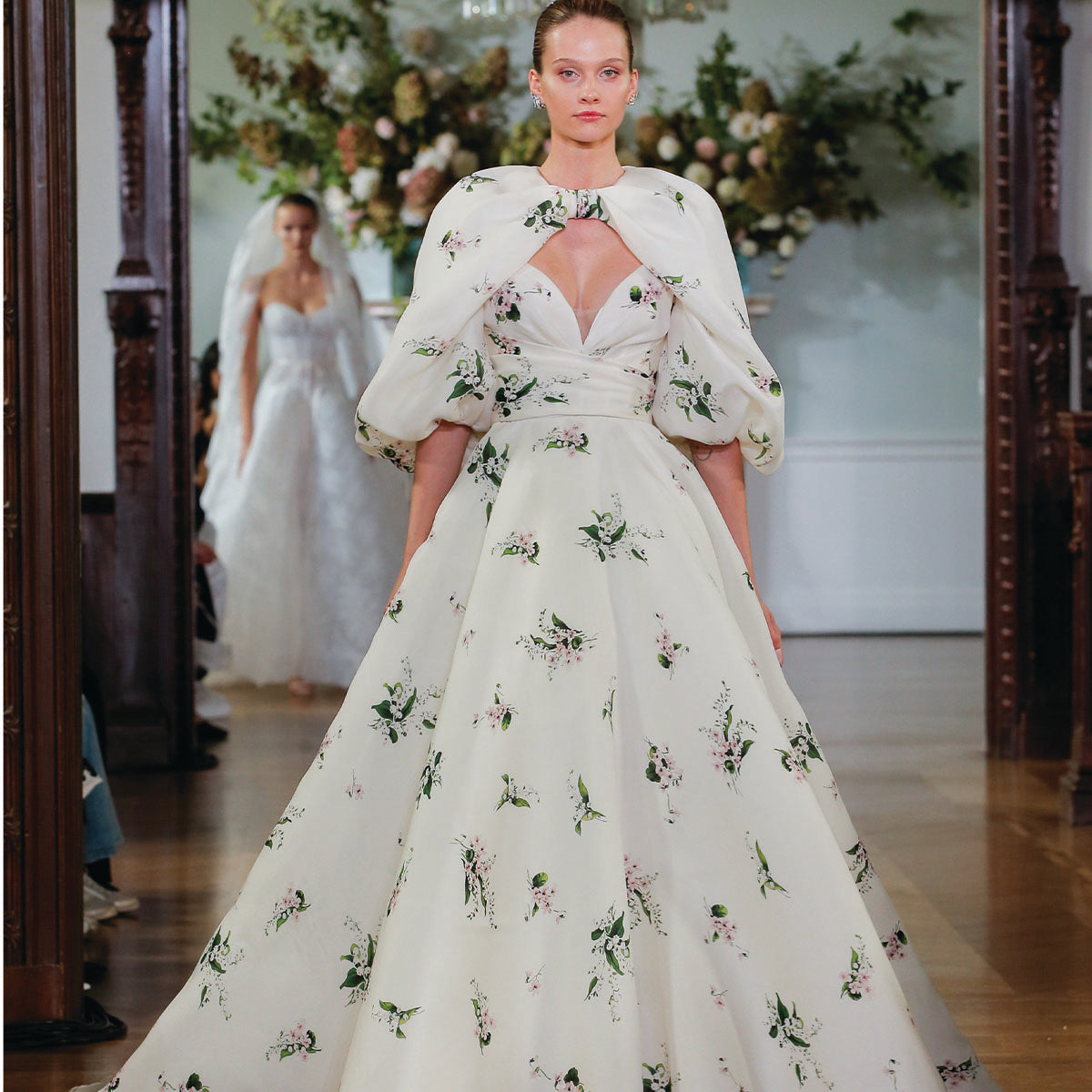 Monique Lhuillier Fall 2026 Bridal Ivory/Multi Pique Gazar strapless draped Beatrix ballgown with billow sleeve Beatrix jacket - runway.