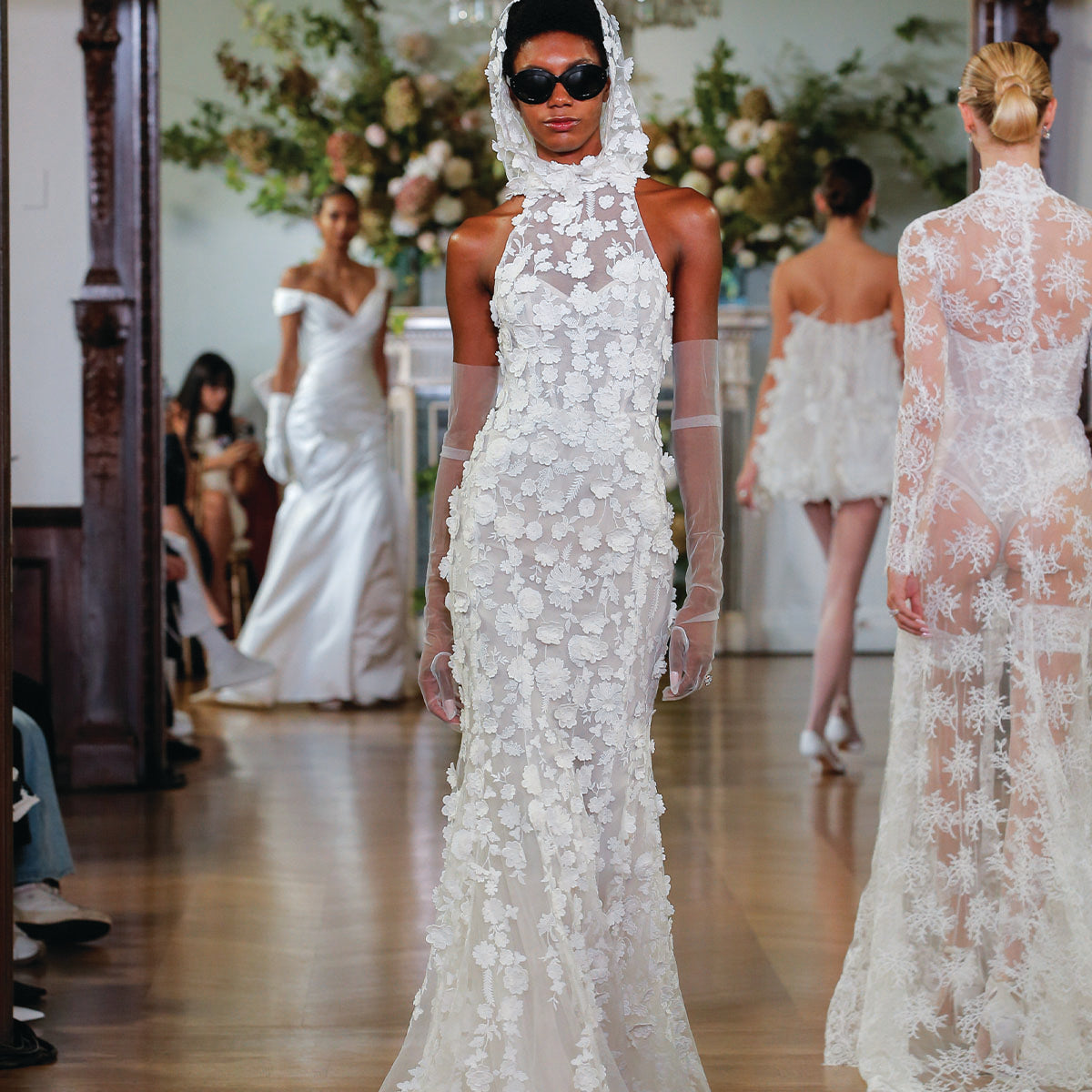 Monique Lhuillier Fall 2026 Bridal silk white/pearl embroidered lace halter Giselle sheath gown with three-dimensional floral embroidery - runway.