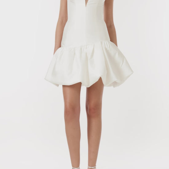 Monique Lhuillier strapless silk white mikado short dress with bubble hem and deep v sweetheart neckline.