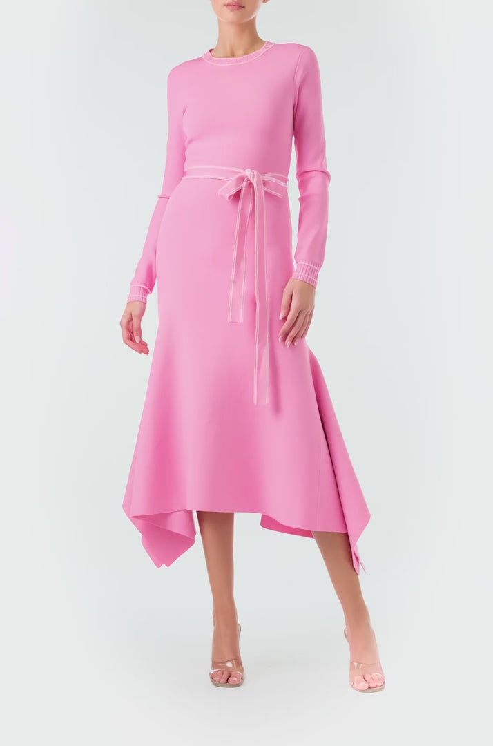 Monique Lhuillier Fall 2024 pink knit long sleeve dress with handkerchief hem and self-tie belt - video.