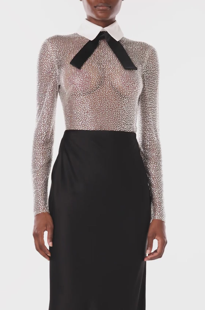 Monique Lhuillier Spring 2024 sheer, silver embroidered body suit with attached collar and detachable, self-tie bow - video.