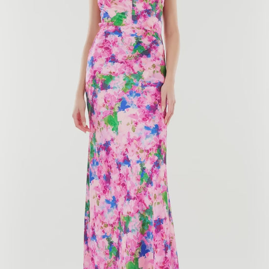 ML Monique Lhuillier Spring 2024 floor length dress with rosette, halter neckline and low V-back in Waterlily Floral crepe-back satin - video.