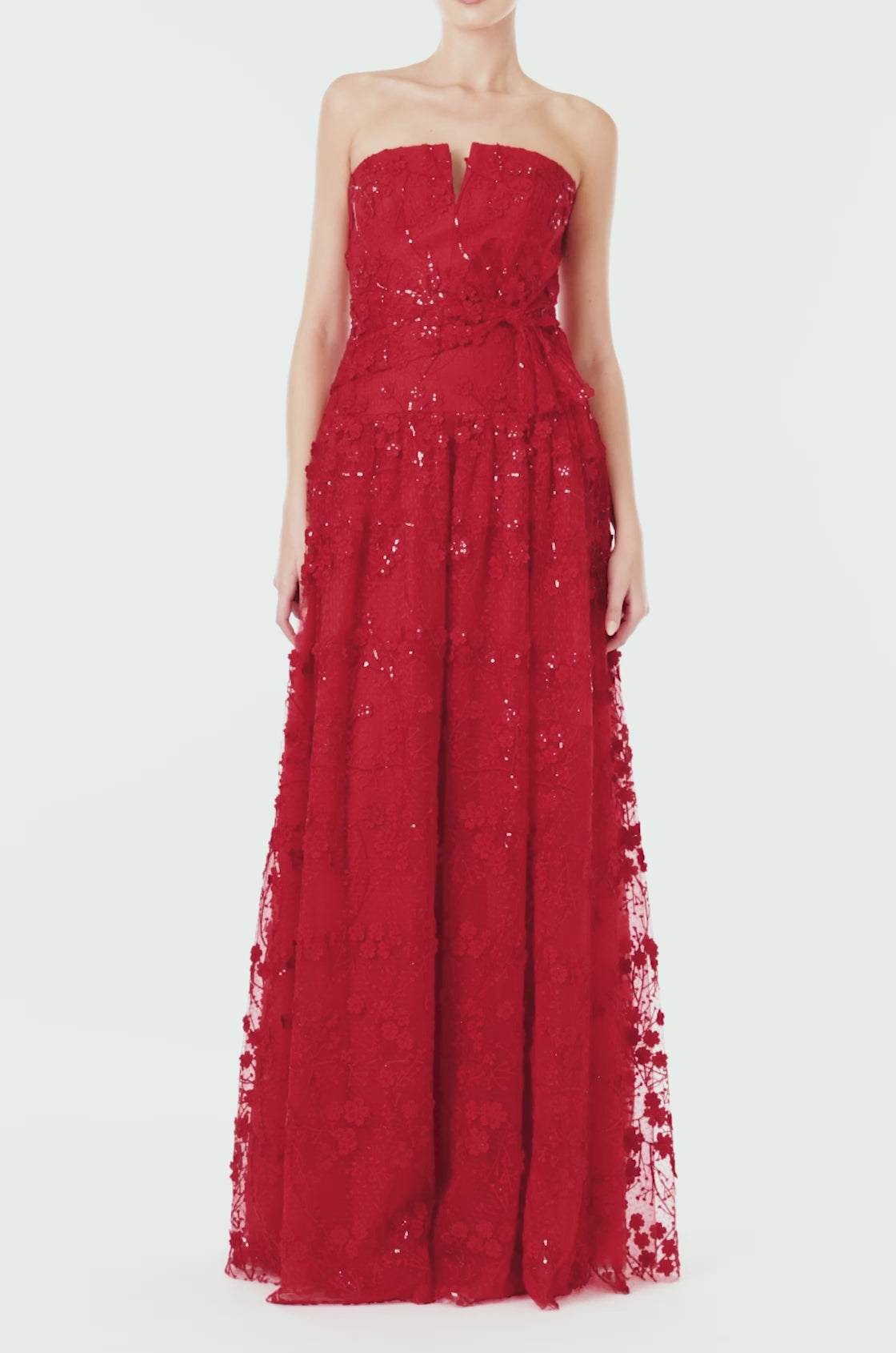 ML Monique Lhuillier red embroidered tulle long dress with strapless bodice and drop waist.
