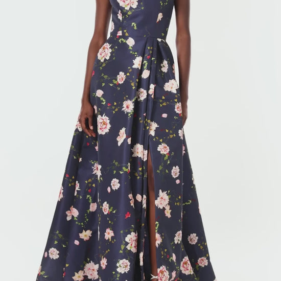 Monique Lhuillier navy floral silk faille gown with jewel neckline and high front leg slit.