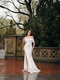 Draped off-the-shoulder gown with slit In Crepe Satin.