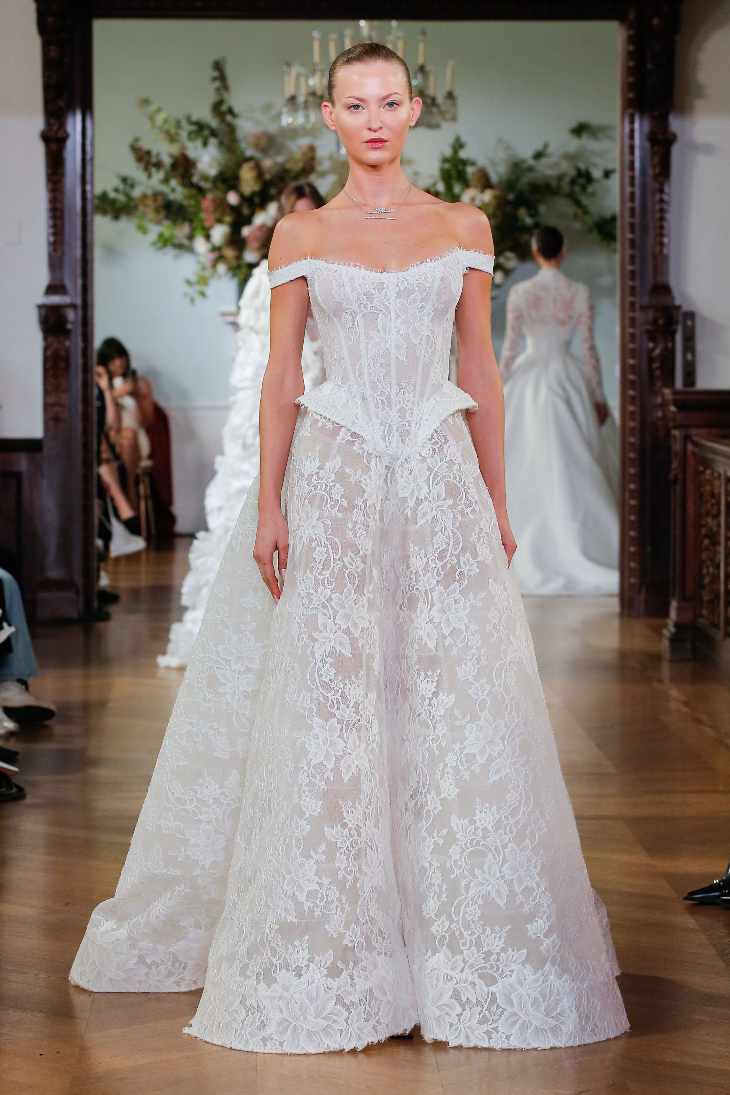 Monique Lhuillier Fall 2026 Bridal silk white chantilly lace off-the-shoulder lace basque waist peplum bodice Nottingham ballgown - runway.