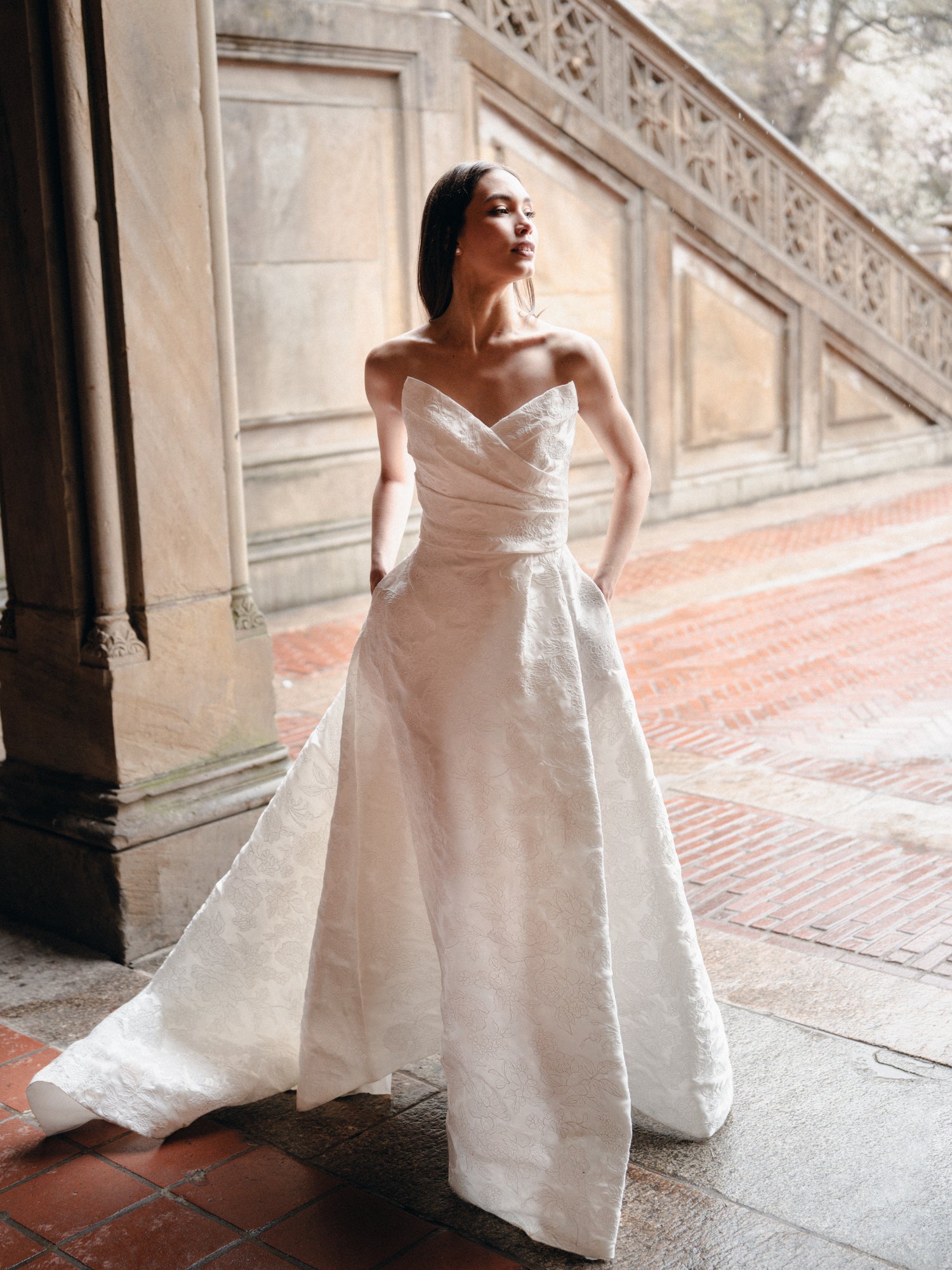 Draped ballgown with skirt slit In Corded Lace Mikado.