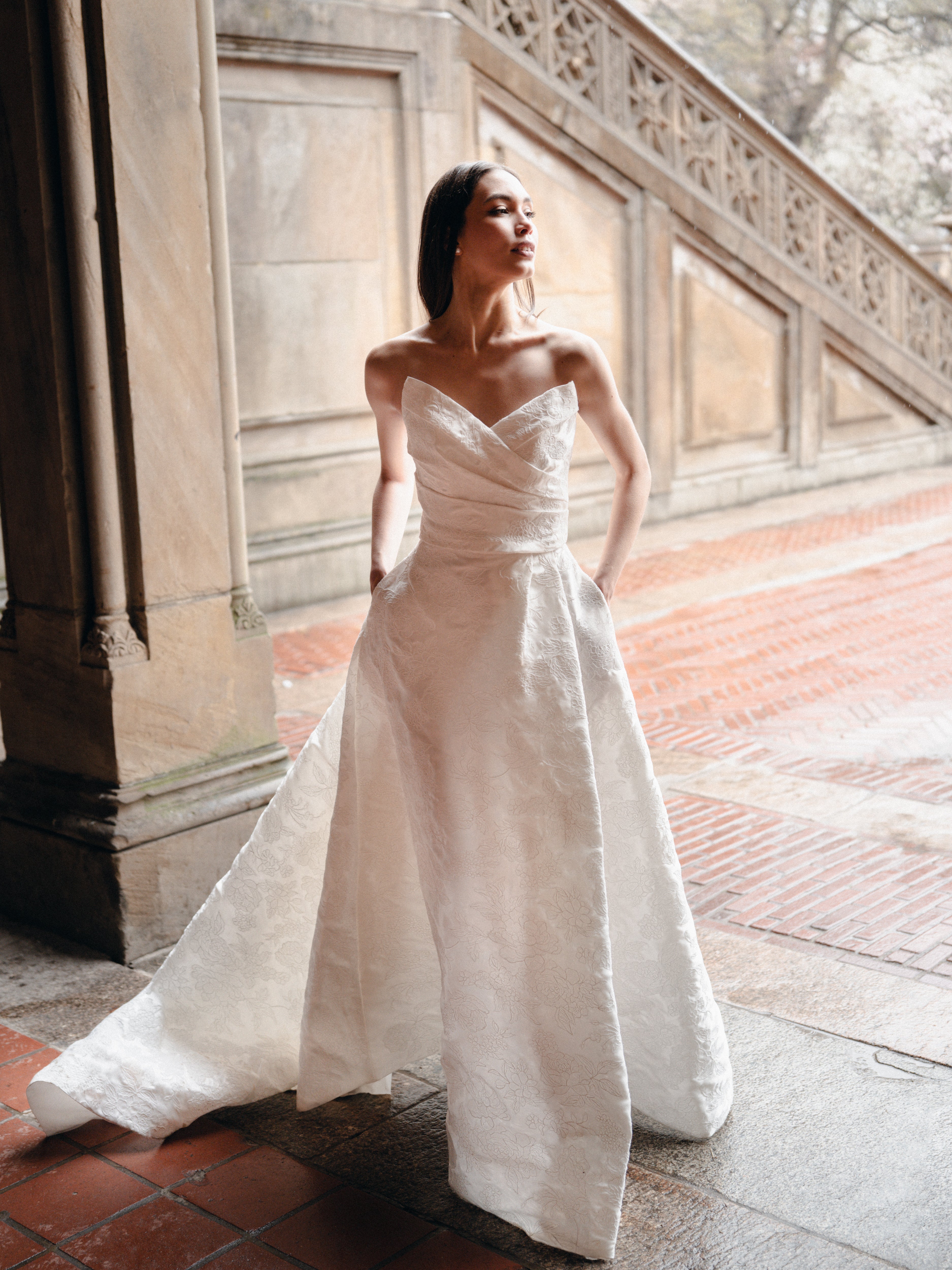 Draped ballgown with skirt slit In Corded Lace Mikado.