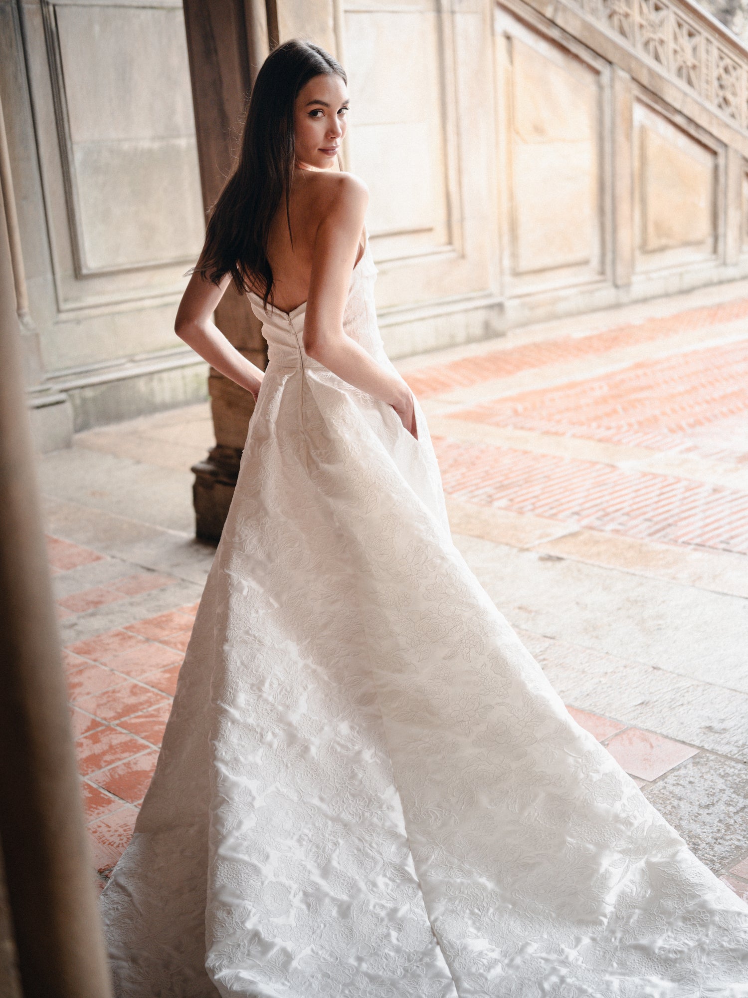 Draped ballgown with skirt slit In Corded Lace Mikado.
