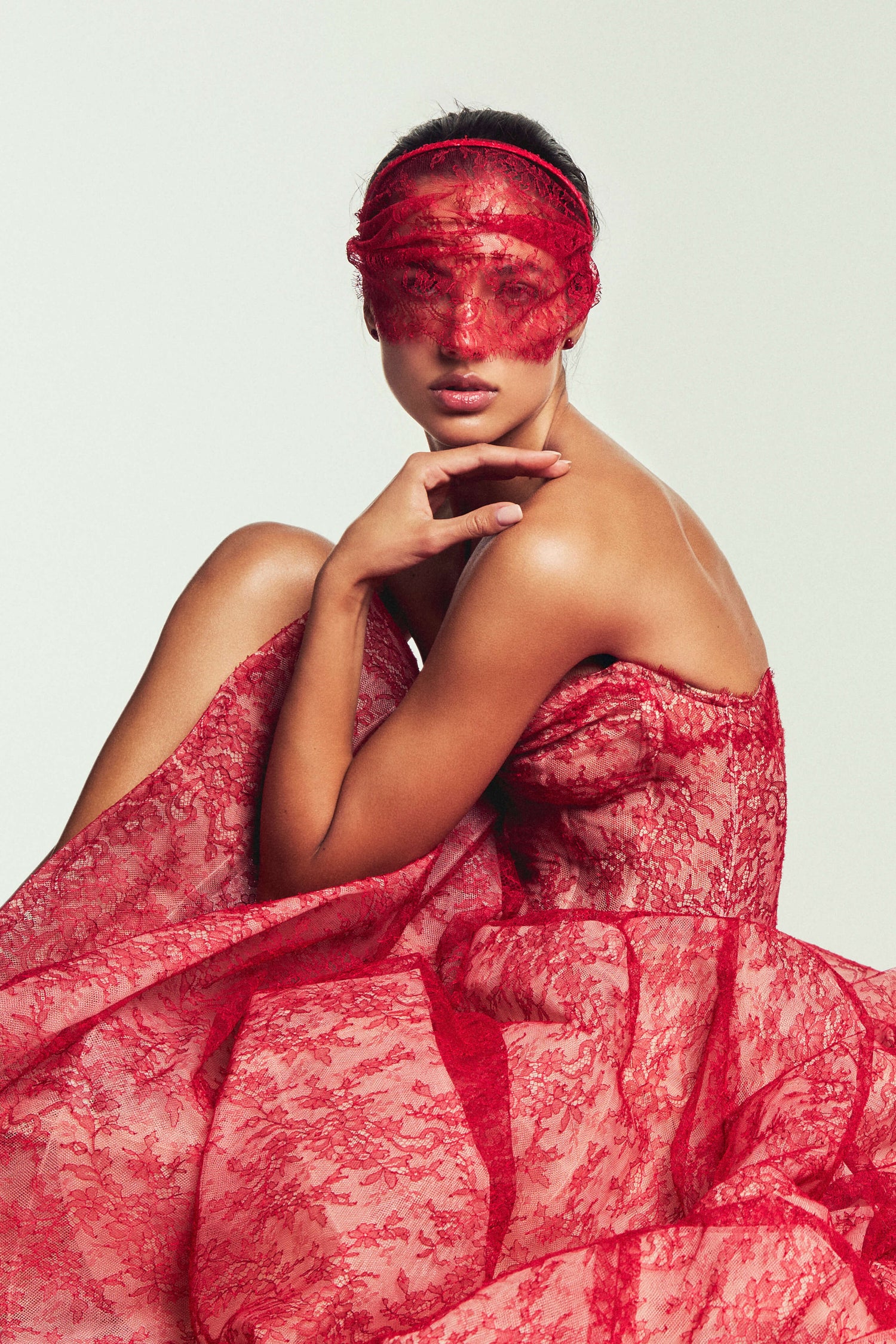 Monique Luillier Spring 2027 Bridal Strapless sweetheart Rouge ballgown in scarlet and nude Chantilly lace with head band with lace veilette.
