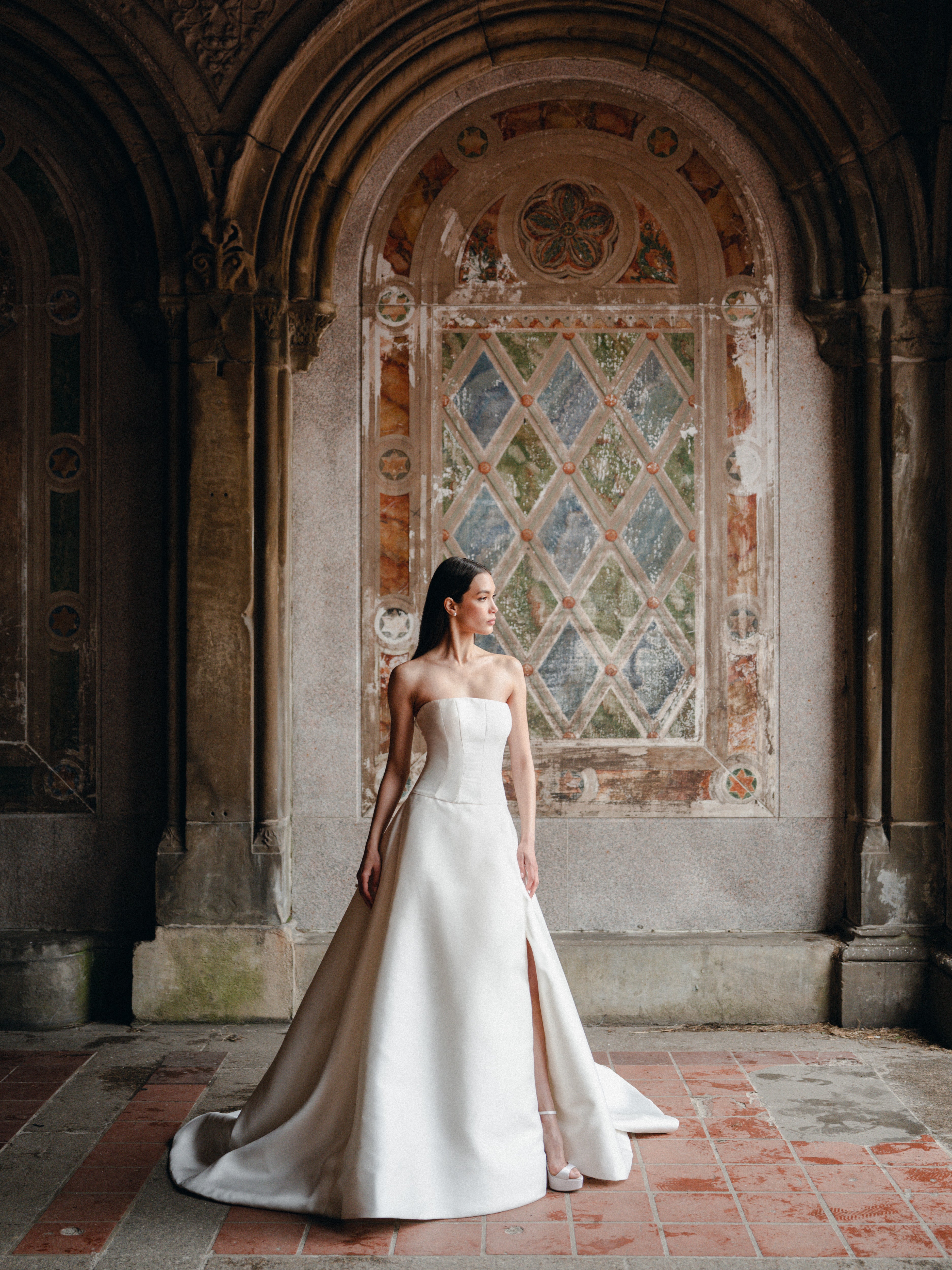 Strapless Mikado ballgown with drop waist and slit.