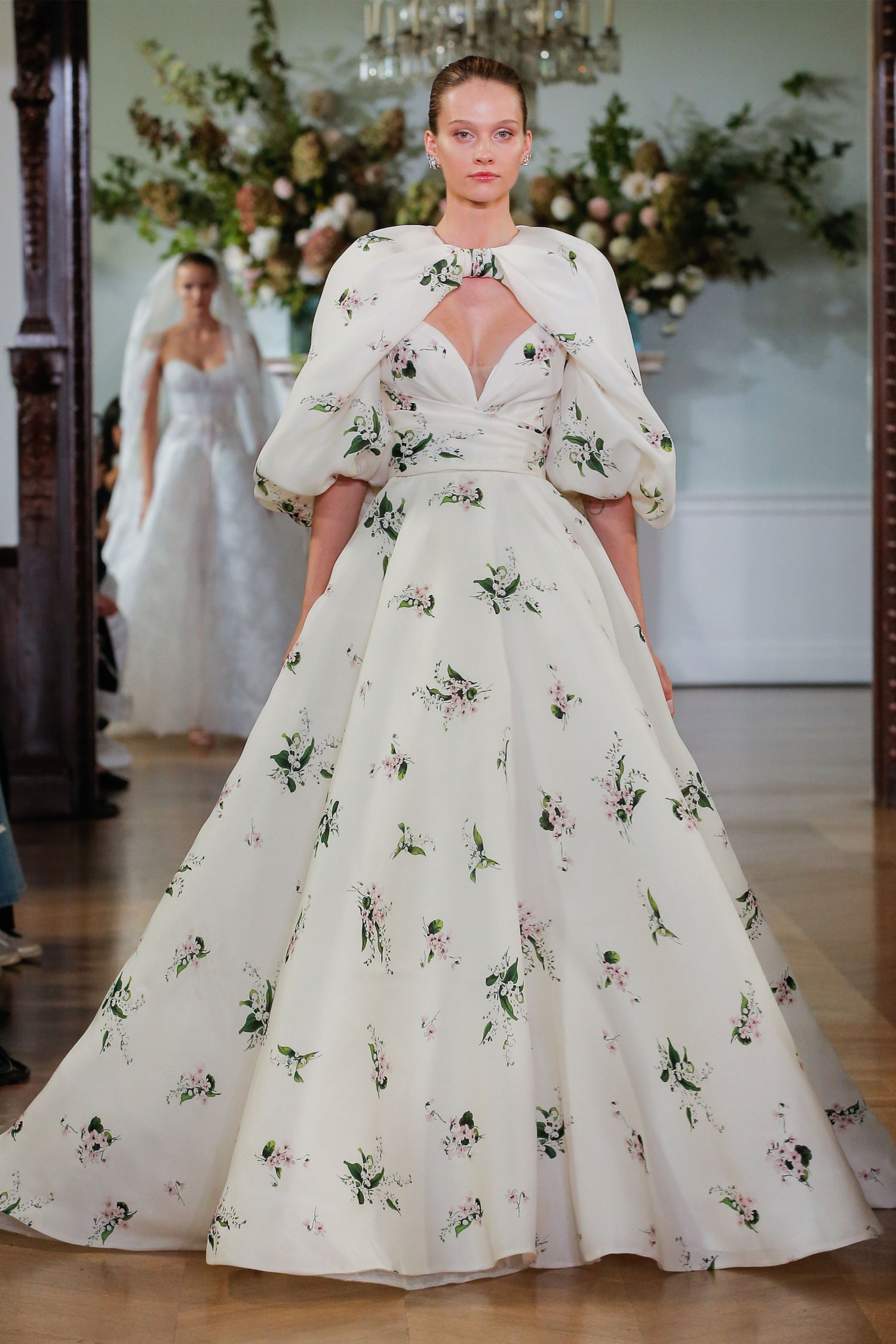 Monique Lhuillier Fall 2026 Bridal Ivory/Multi Pique Gazar strapless draped Beatrix ballgown with billow sleeve Beatrix jacket - runway.