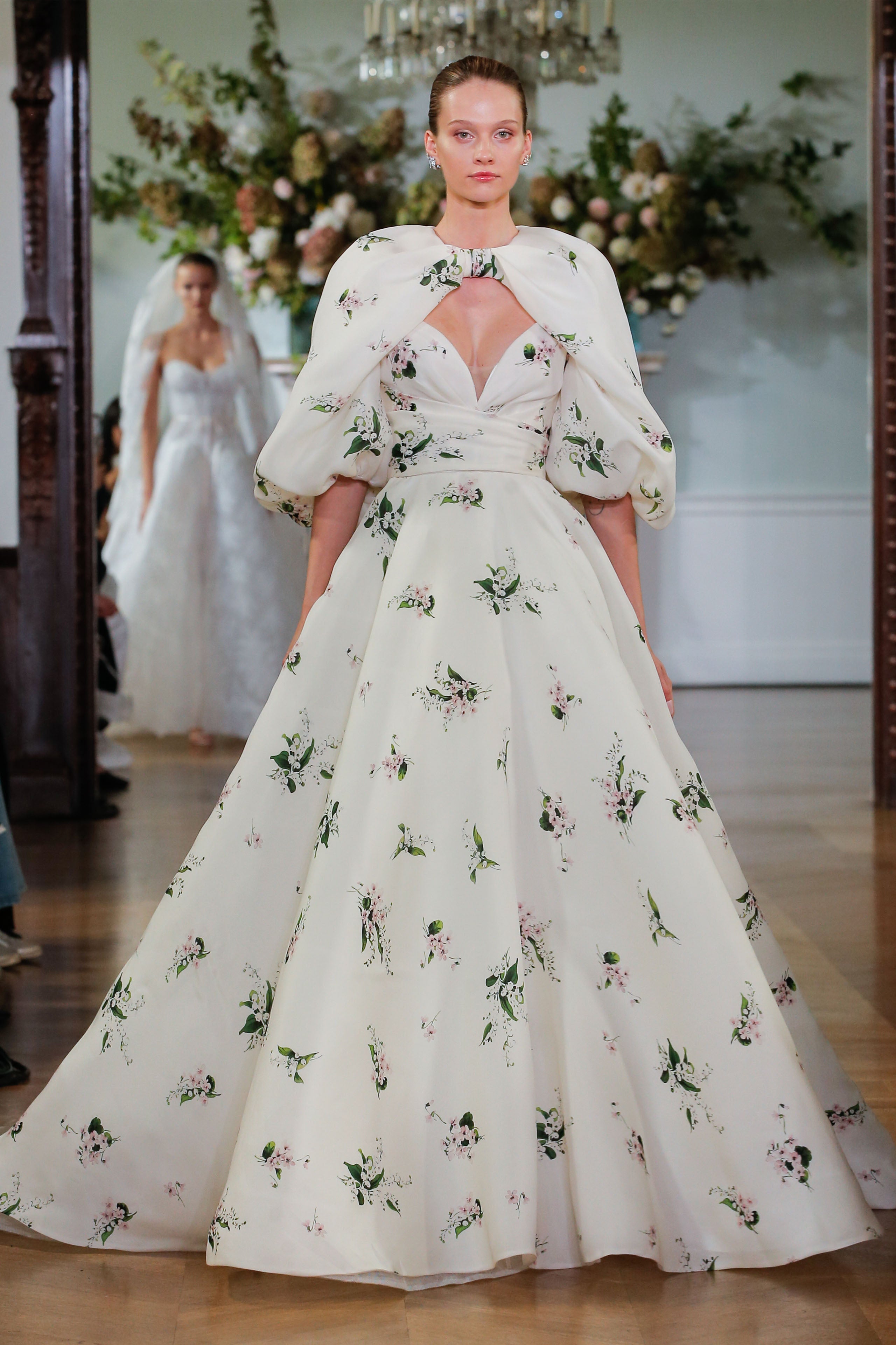 Monique Lhuillier Fall 2026 Bridal Ivory/Multi Pique Gazar strapless draped Beatrix ballgown with billow sleeve Beatrix jacket - runway.