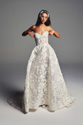 Monique Lhuillier Spring 2027 Bridal Strapless sweetheart June ball gown in silk white three-dimensional embroidered lace.