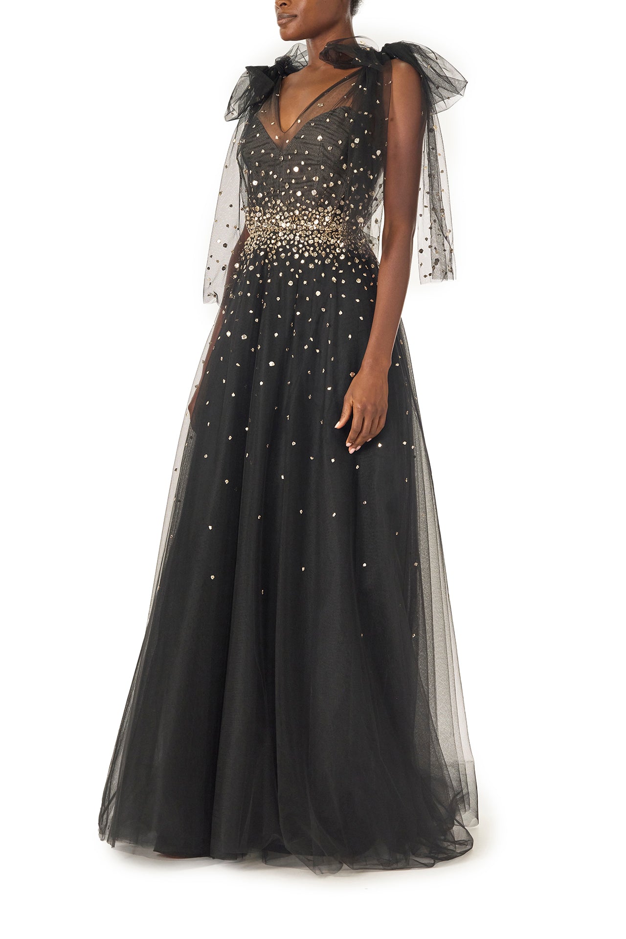 Monique Lhuillier Noir tulle ballgown with bow shoulder ties, V-neckline and gold embroidery - left side.