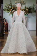 Monique Lhuillier Fall 2026 Bridal ivory re-embroidered lace scalloped v-neck long sleeve Divinity ballgown with dropped waist and structured skirt - runway.