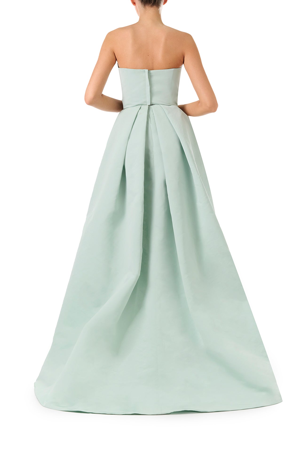 Monique Lhuillier Spring 2023 ball skirt with front slit in pistachio silk faille fabric - back.