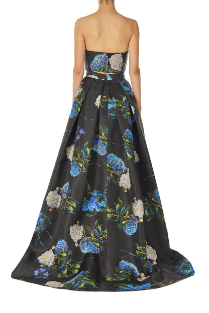 Monique Lhuillier Fall 2024 Pleated ball skirt with pockets and high front leg slit in Night Sky Hydrangea Printed Gazar - back.