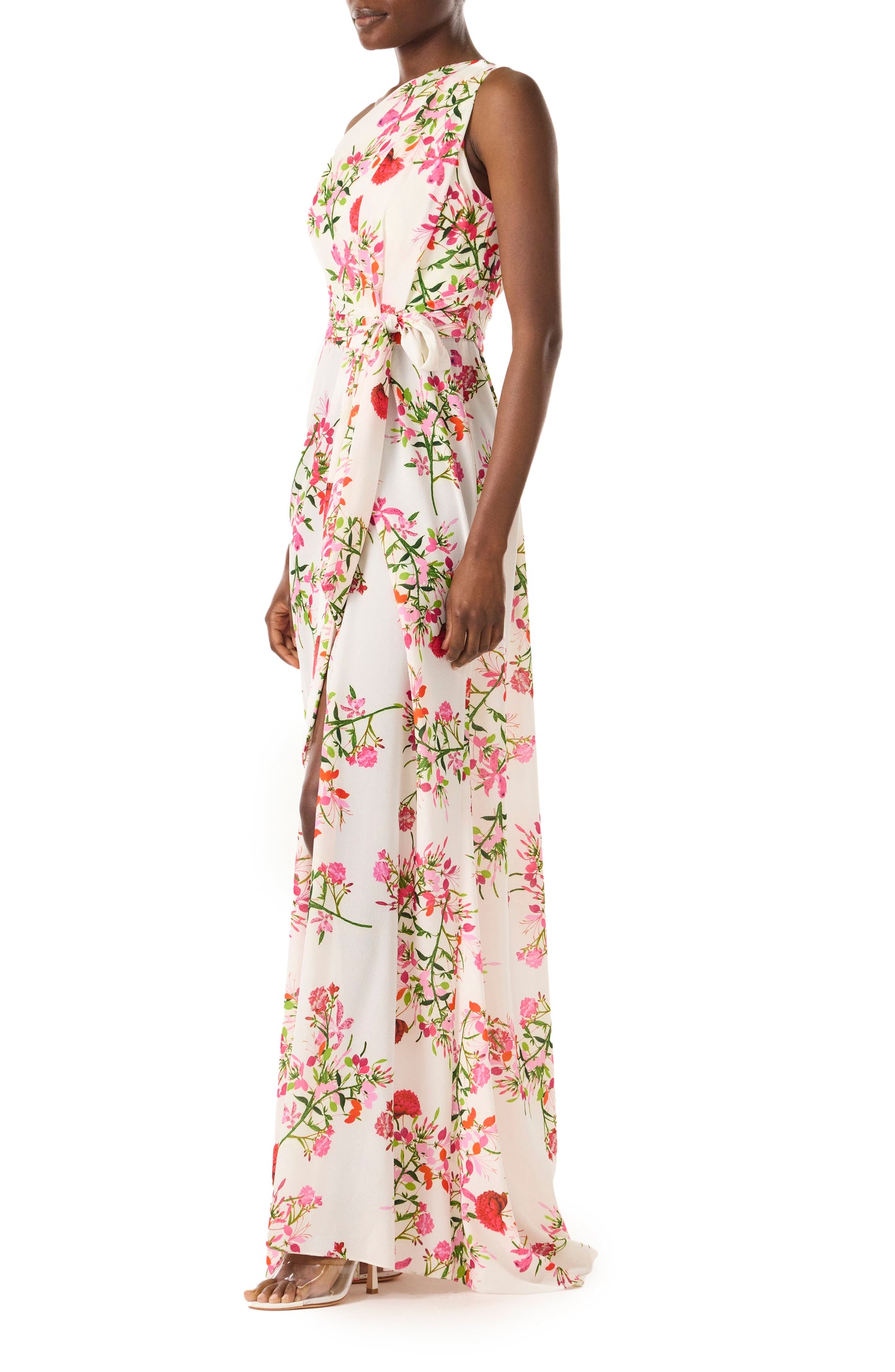 Monique Lhuillier One shoulder draped gown with self-tie belt and high front slit in Silk White Fuchsia floral printed crepe - side.
