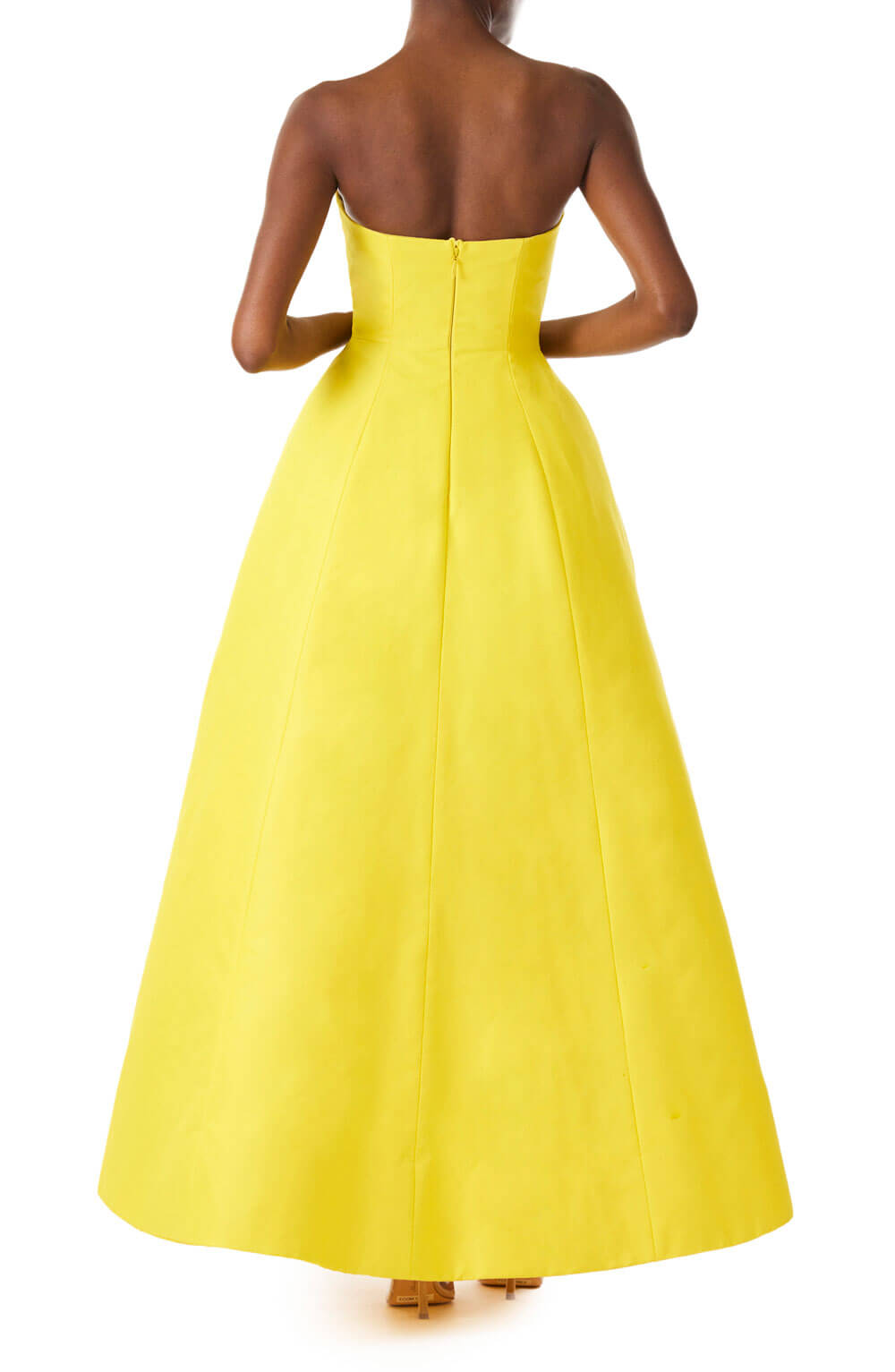 Monique Lhuillier canary yellow strapless gown with high-low hem in cotton/silk faille fabric.