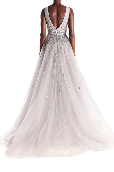 Smokey grey tulle and metallic embroidery gown with v-neck bodice and full skirt.