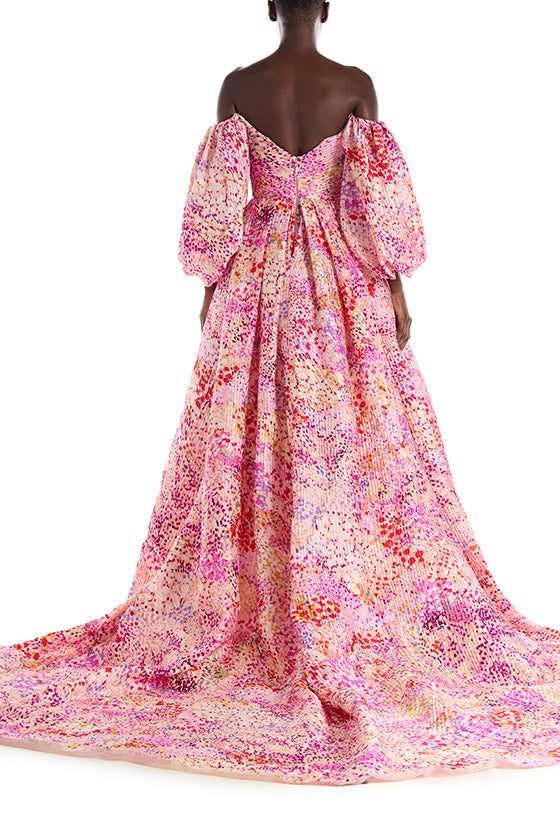 Azalea pink printed jacquard gown with puff sleeves, sweetheart neckline and v-back - back view.