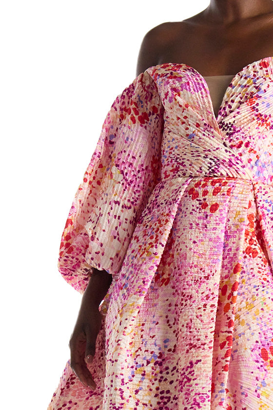 Close up photo of the Azalea pink printed jacquard gown with puff sleeves and sweetheart neckline.
