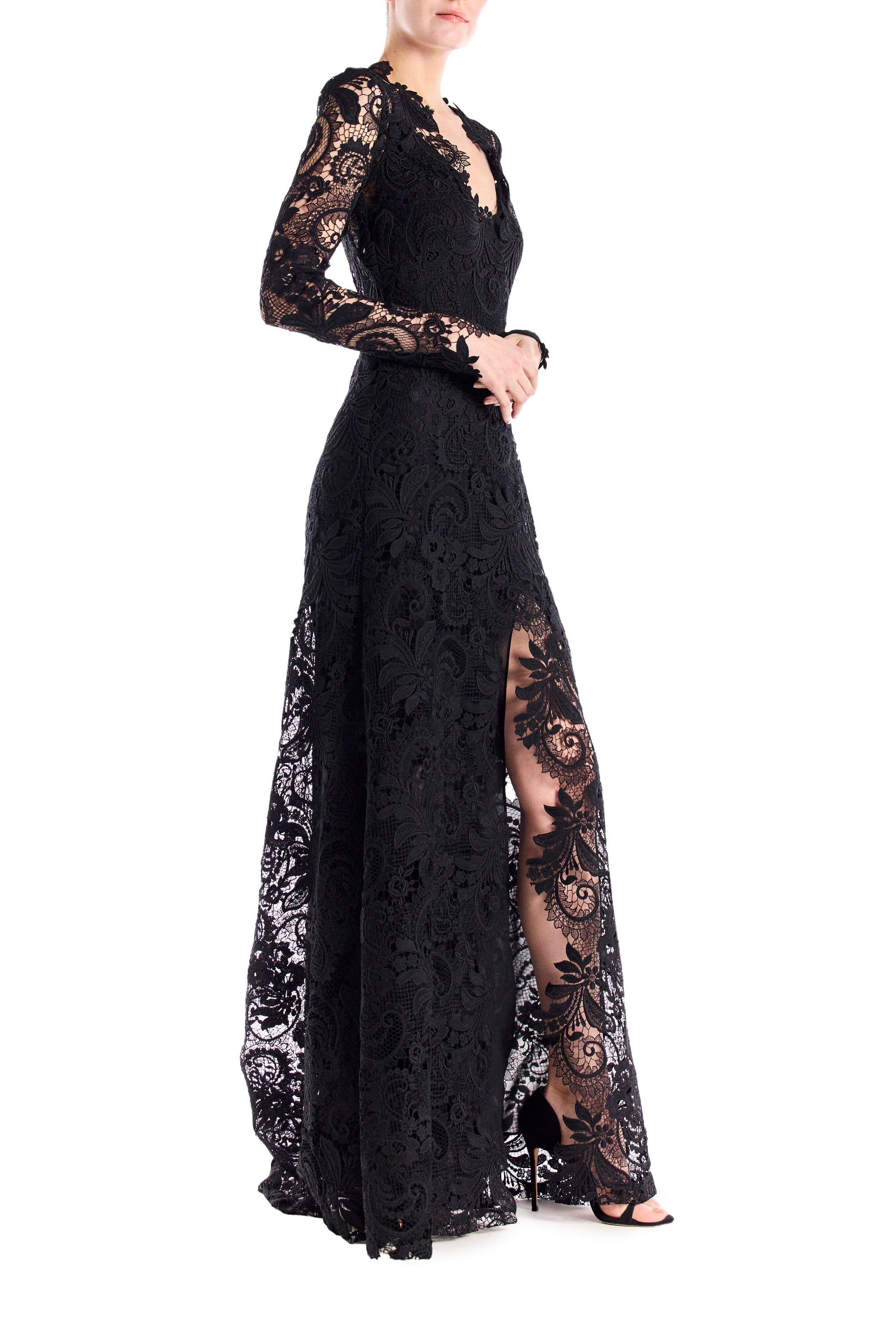 Monique Lhuillier long sleeve black lace gown with v-neck and high leg slit.