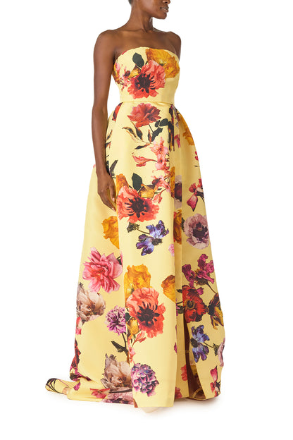 Monique Lhuillier Fall 2024 strapless ball gown with pleated waist and high side slit in soleil floral fabric - side.