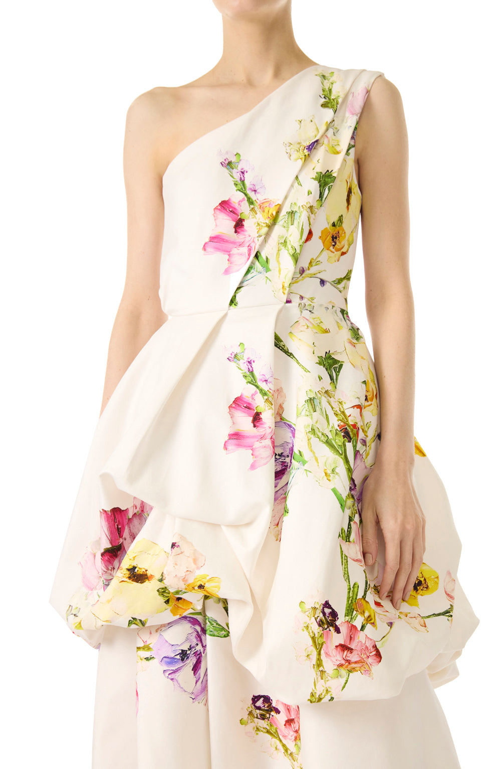 Monique Lhuillier silk white botanical printed mikado gown with one shoulder neckline and tufted skirt.