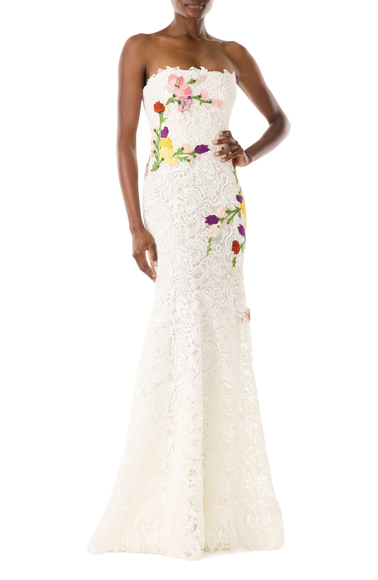 Monique Lhuillier white lace strapless gown with floral embroidery.