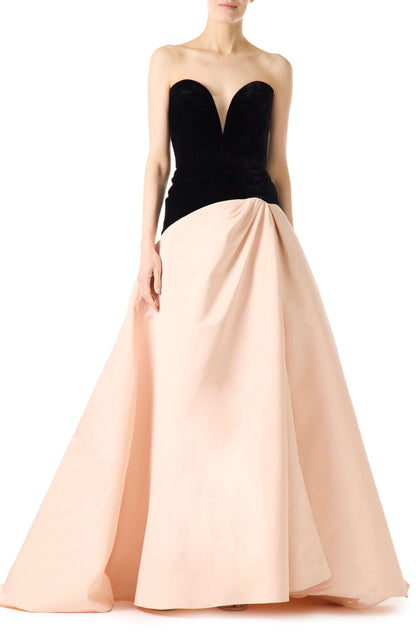 Monique Lhuillier pale blush and noir strapless ballgown with sweetheart neckline, drop waist and high slit in skirt.  