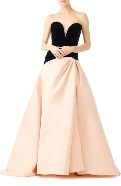 Monique Lhuillier pale blush and noir strapless ballgown with sweetheart neckline, drop waist and high slit in skirt.  