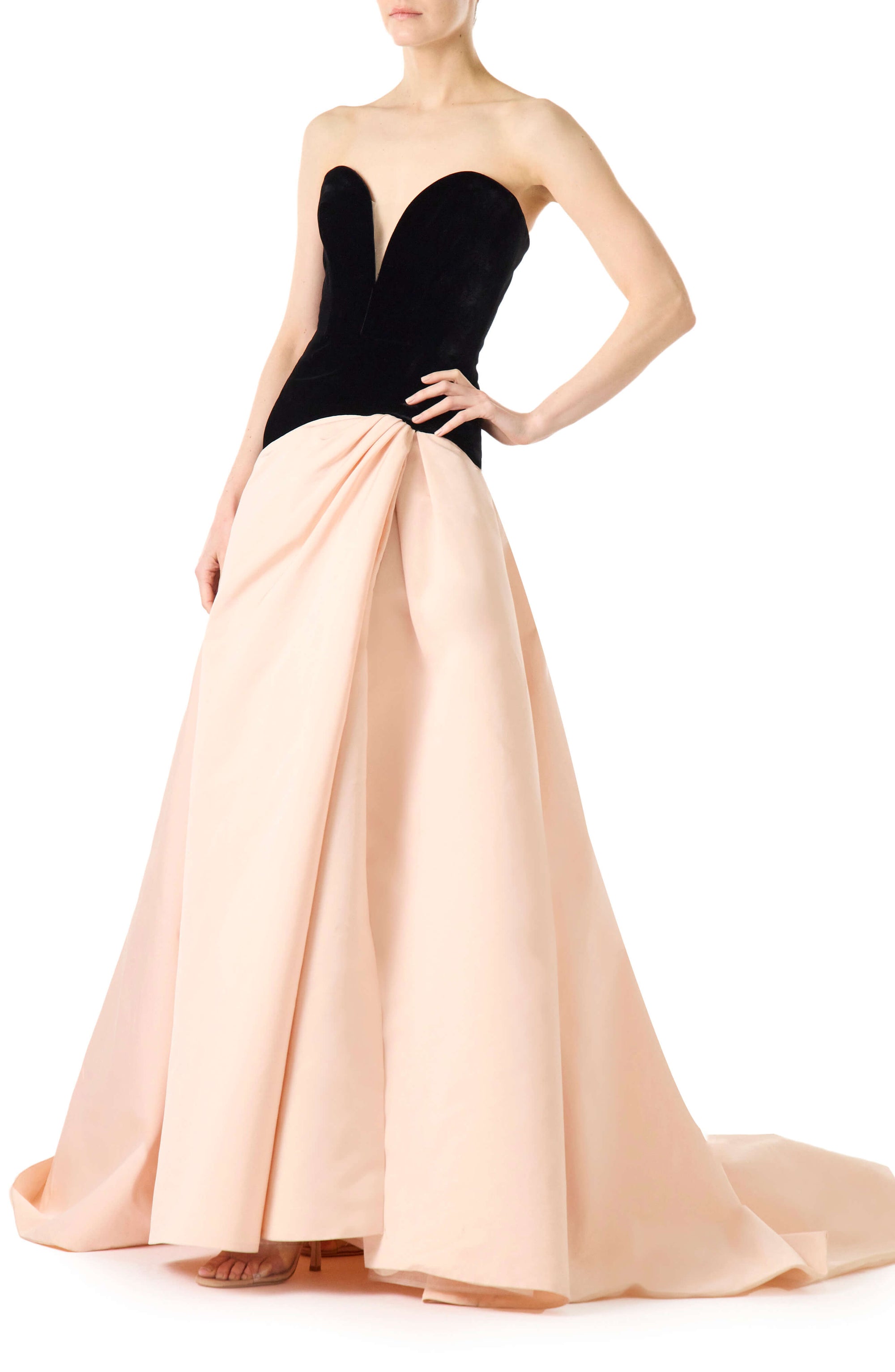 Monique Lhuillier pale blush and noir strapless ballgown with sweetheart neckline, drop waist and high slit in skirt.