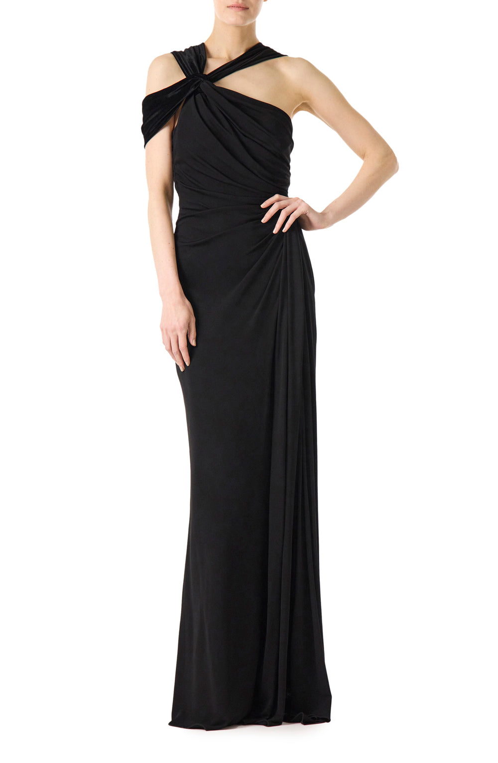Monique Lhuillier asymmetric neckline gown in black jersey and velvet with draped bodice and front slit.