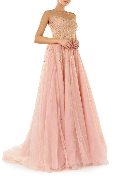 Monique Lhuillier strapless ballgown in rose colored tulle and gold embroidery.