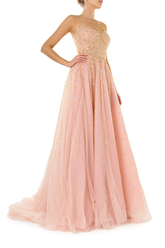 Monique Lhuillier strapless ballgown in rose colored tulle and gold embroidery.