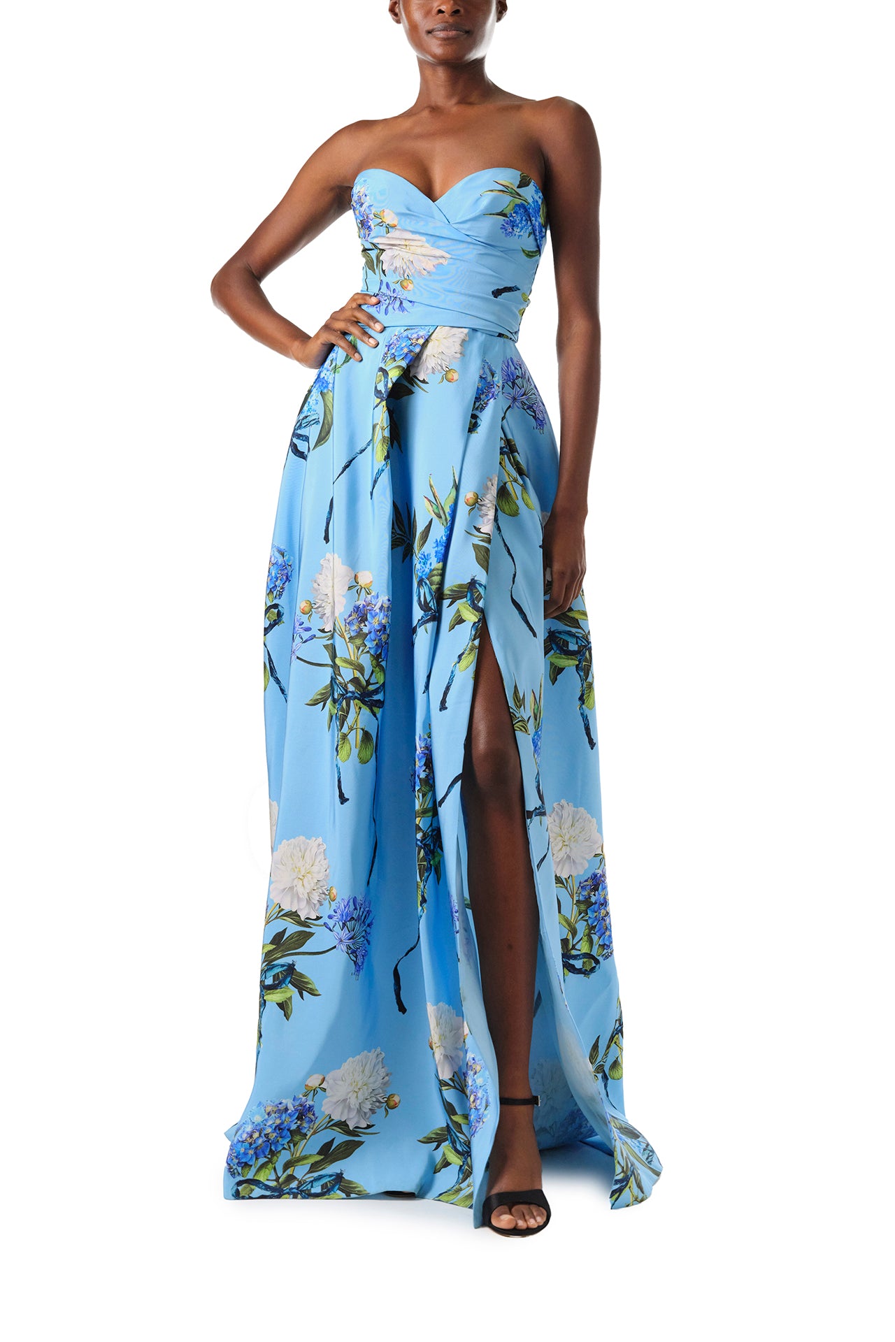 Monique Lhuillier Fall 2024 strapless, a-line gown with sweetheart neckline and high leg slit in Sky Blue Hydrangea printed silk faille - front with slit.