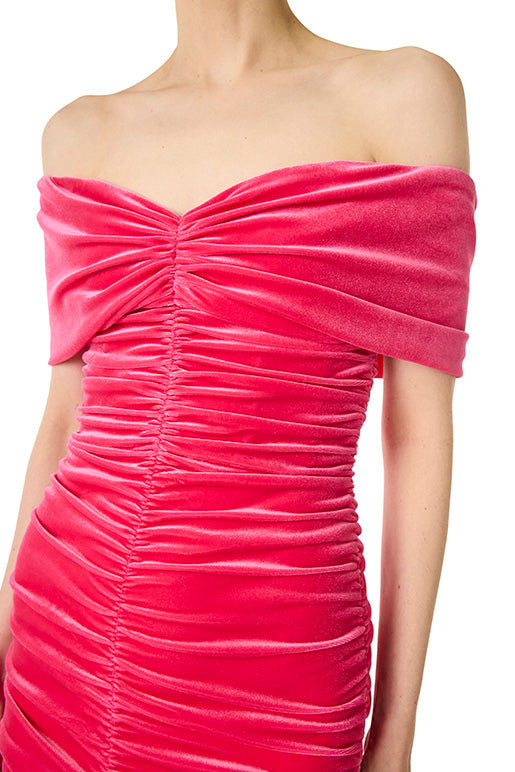Monique Lhuillier off the shoulder gown with center ruching in fuchsia velour fabric.