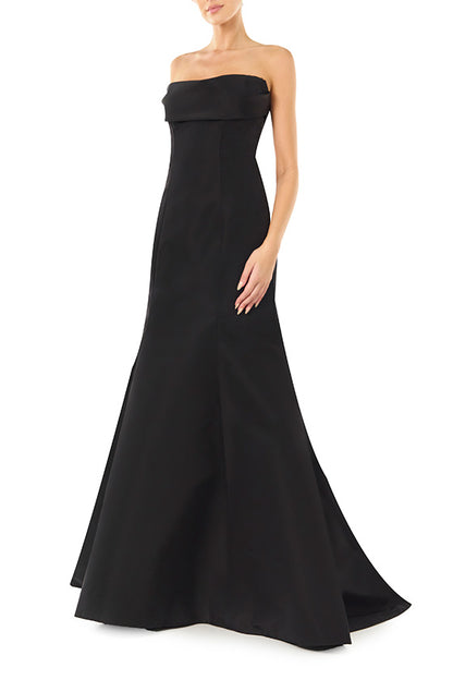 Monique Lhuillier noir strapless, faille evening gown with draped bodice and mermaid skirt.