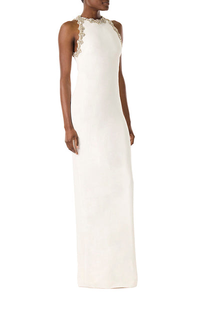 Monique Lhuillier silk white crepe gown with jewel neckline and crystal embroidery.