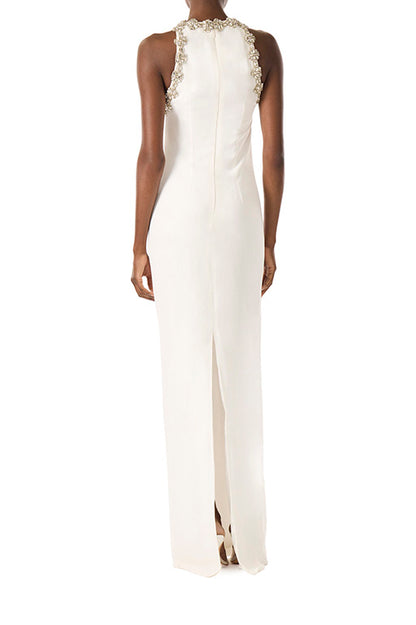 Monique Lhuillier silk white crepe gown with jewel neckline and crystal embroidery.